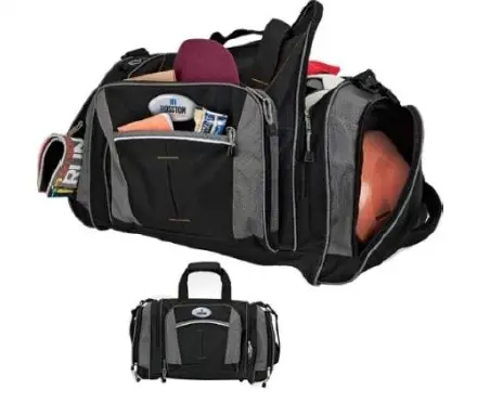 Black and gray duffle bag filled with sporting equipment